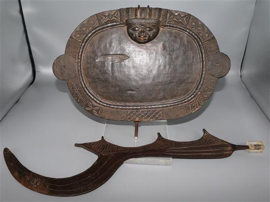 Three carved tribal figures, spoons, tray, etc.